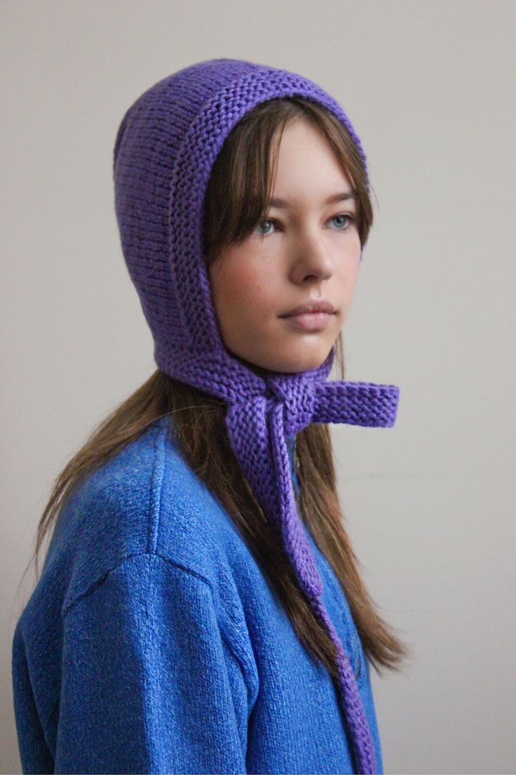 Say hi to a new product at our shop: knitted bonnet. At the moment, the most trend-driven style is the bonnet, a modern version of the headgear popular among Puritans in the 17th century, and its very close relation, the knitted hood, a crafty version of a balaclava without the face covering. Bonnets are a perfect beanie and balaclava hybrid. Great hat alternative that ought to be on your radar. Made from 70% merino wool and 30% microfiber. Handmade with love. in the personalization line, indica Knitted Bonnet, Bonnet Hat, Knitted Hood, Face Covering, Turbans, Face Coverings, Style Expert, Winter 2024, Hair Accessories Headbands