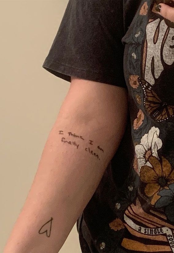 a person with a tattoo on their arm