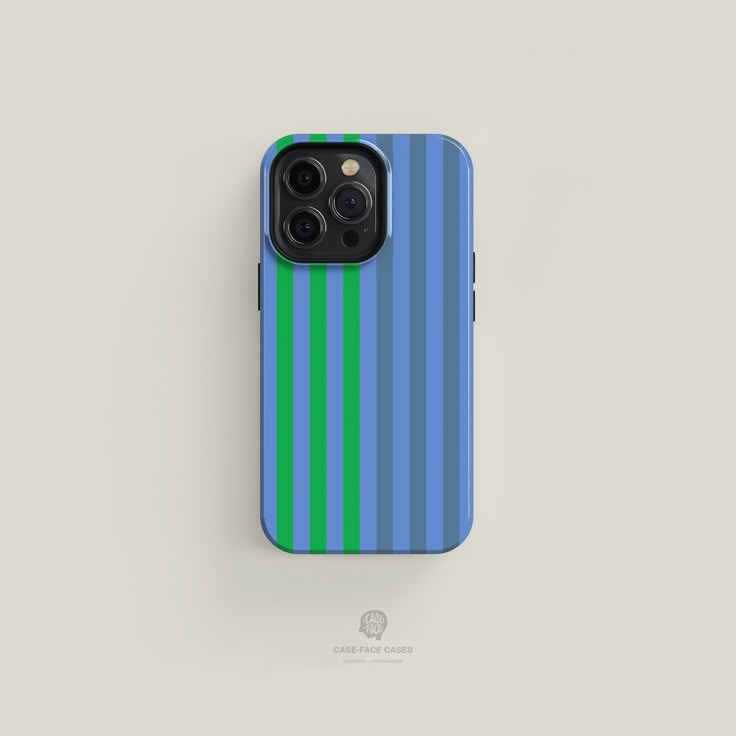 a blue and green striped iphone case sitting on top of a white surface with the back cover open