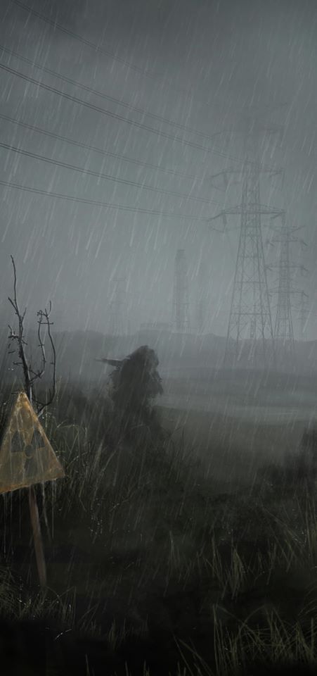 an umbrella sitting in the middle of a field on a rainy day with power lines in the background