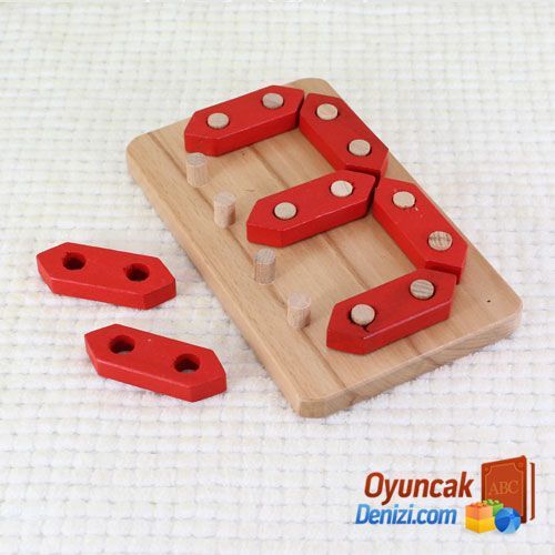 a wooden toy with four red dominos on it's side and three smaller ones in the middle