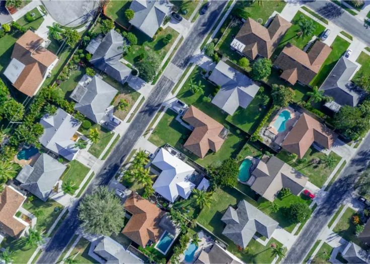 an aerial view of houses in a neighborhood