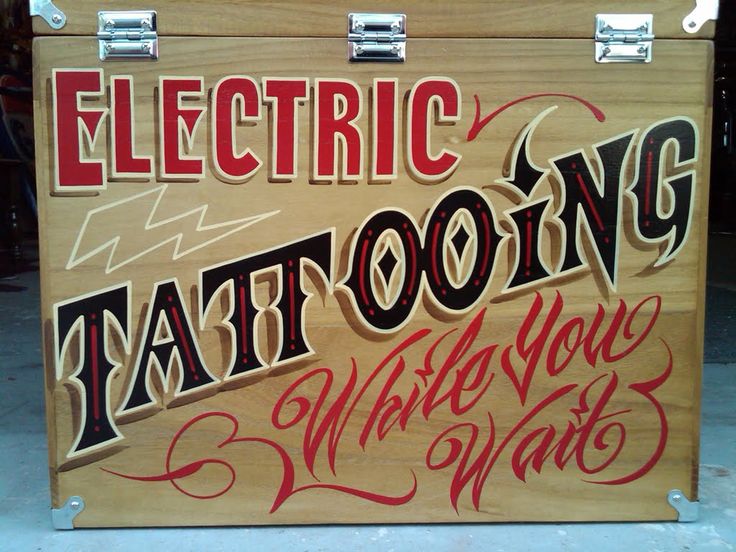 a wooden box with writing on it that says electric tattooing and what you want