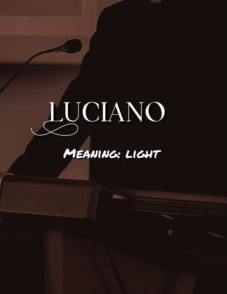 a man standing at a podium in front of a microphone with the words luciano meaning light