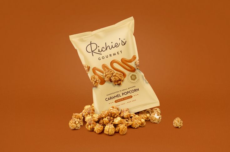 a bag of caramel popcorn sitting on top of a table