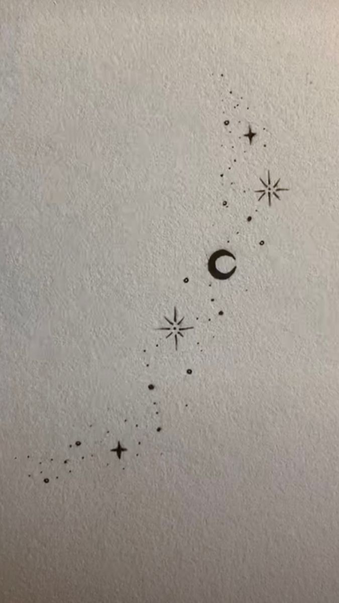 an ink drawing of the moon and stars