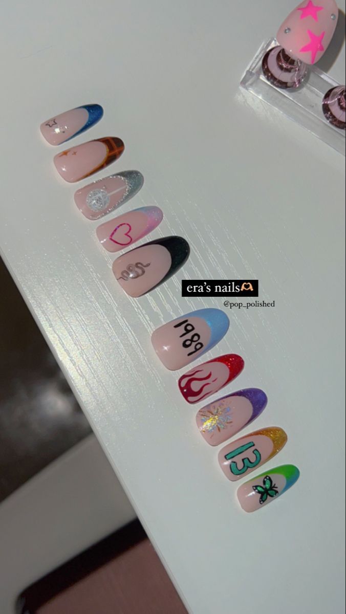 Nail Inspo For Eras Tour, Cute Taylor Swift Nail Ideas, Eras Tour Nail Ideas Debut, Taylor Swift Eras Tour Must Haves, Acrylic Nail Designs Taylor Swift, Ears Tour Nail, Taylor Swift Lover Nails French Tip, Taylor Swift Eras Tour Nails French Tip, Taylor Swift Eras Tour Nails Ideas