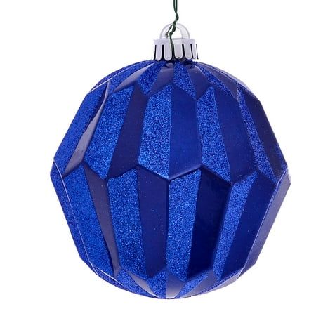 a blue ornament hanging from a string