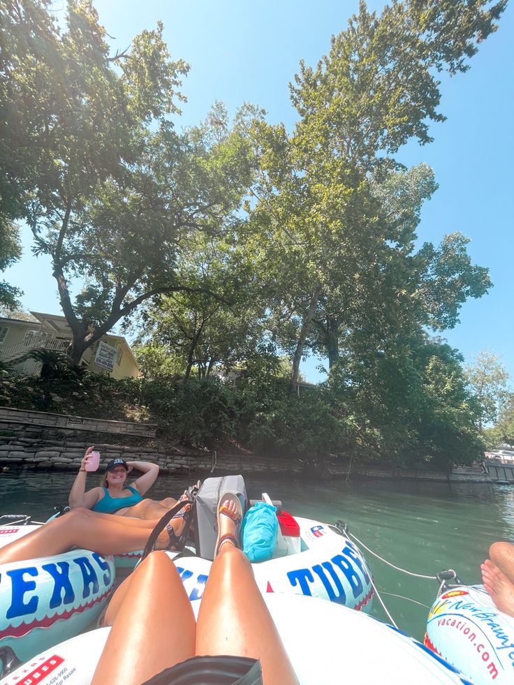 two people on inflatables floating down a river