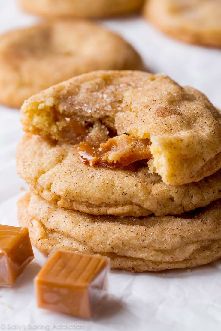 a stack of cookies sitting next to each other on top of a white paper towel