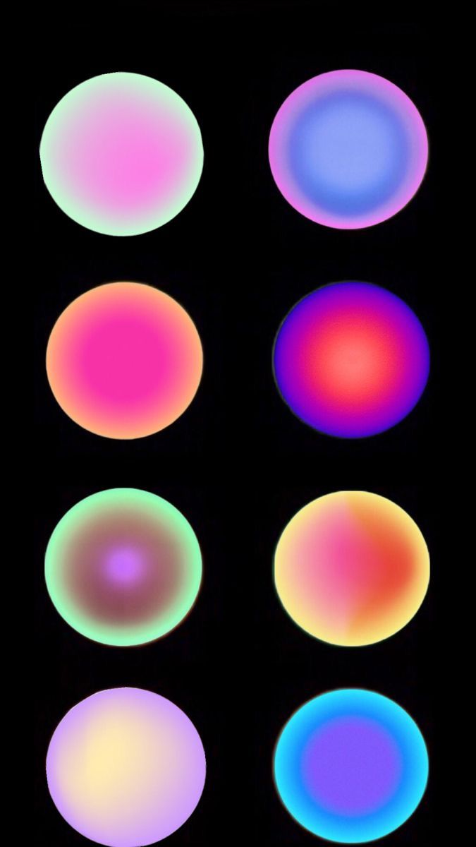 four different colored circles on a black background