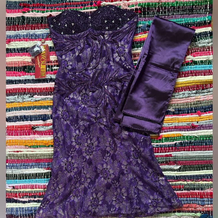 Vintage Purple Beaded May Queen Dress New With Tags. The Dress Is In Mint Condition. Perfect For Homecoming Or Other Special Occasions. The Dress Is A Size 6 And Fits True To Size. Let Me Know If You Have Any Questions! Great Gatsby Prom Dresses Purple, Dark Purple Queen Dress, Dark Purple Corset Dress, Festive Sleeveless Lace Dress, Embellished Purple Evening Sets, Festive Purple Sleeveless Dress, Festive Evening Lace Sets, Embellished Fitted Lace Sets, Fitted Purple Dress For Festive Occasions