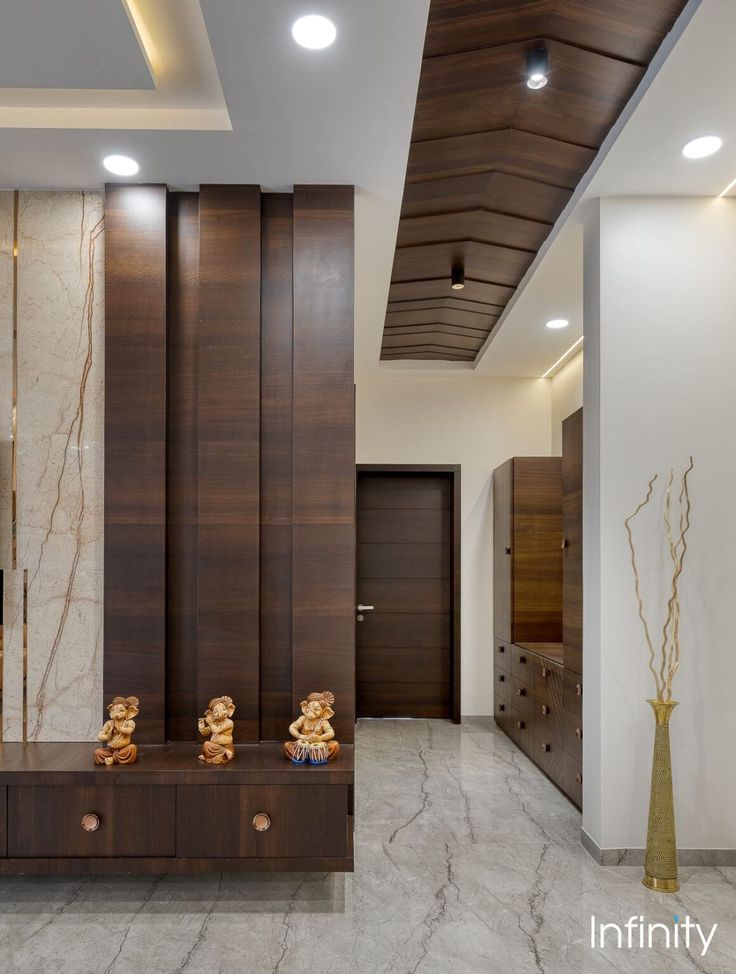 the interior of a modern apartment with marble floors and walls, wood paneled ceilings