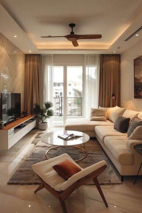 a living room filled with furniture and a flat screen tv