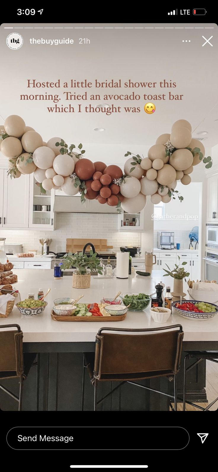 the kitchen is decorated with balloons and greenery as well as other decorations for an event