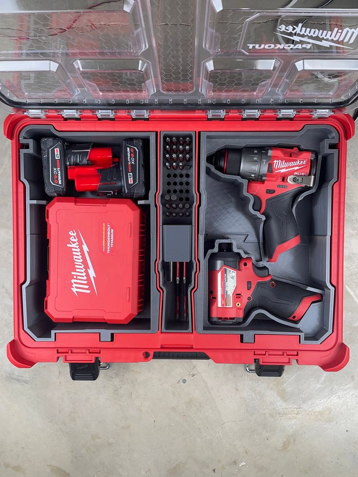 a red tool box with tools in it