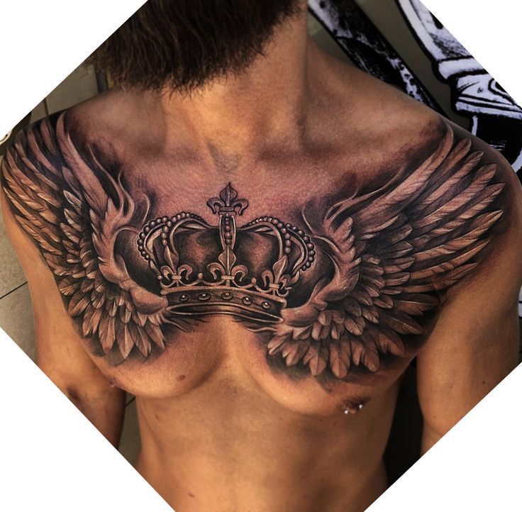 a man with a crown and wings tattoo on his chest