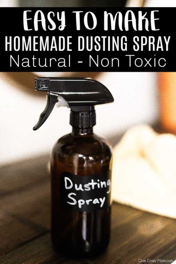 a bottle of disinfectant spray sitting on top of a wooden table with the words easy to make homemade dustin spray