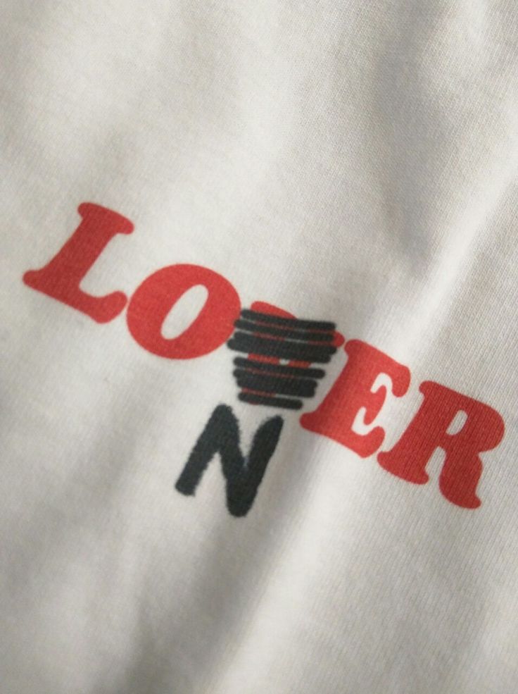 a white shirt with the word loer printed on it