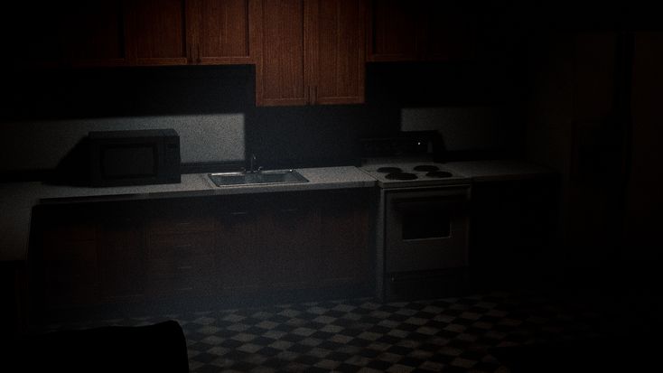 a dark kitchen with an oven, sink and microwave