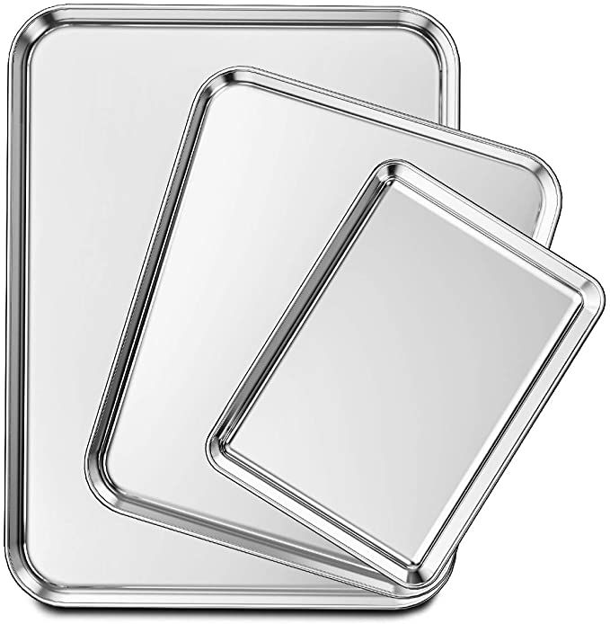 three square silver metal trays on a white background