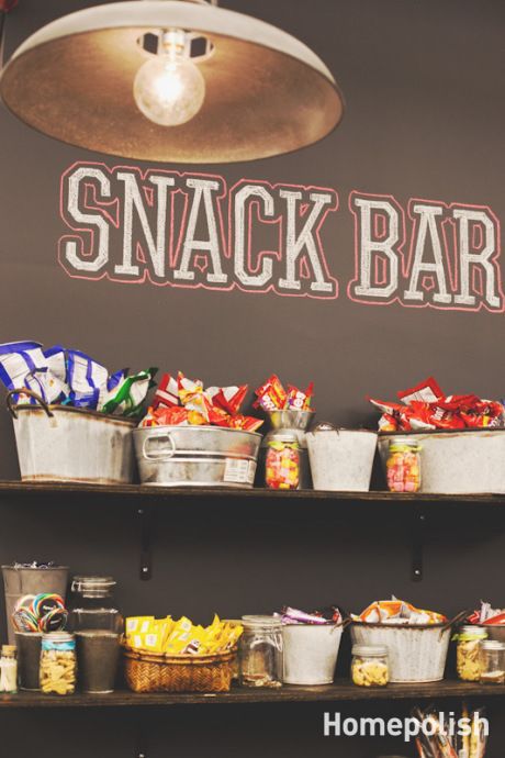 the snack bar is stocked with snacks and condiments