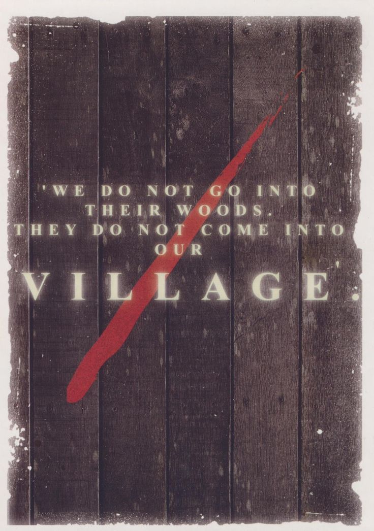 an old wooden sign with the words village painted on it's wood planks