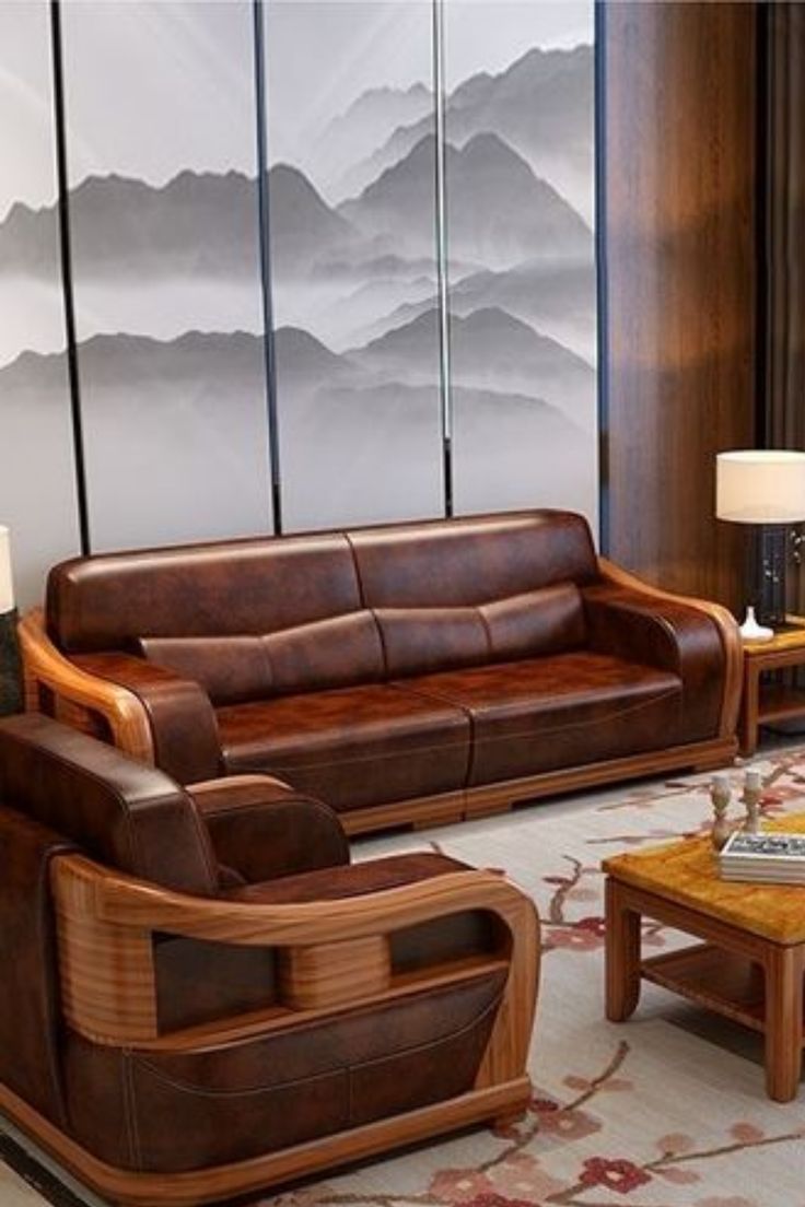 a living room filled with furniture and a large painting on the wall behind it's glass windows