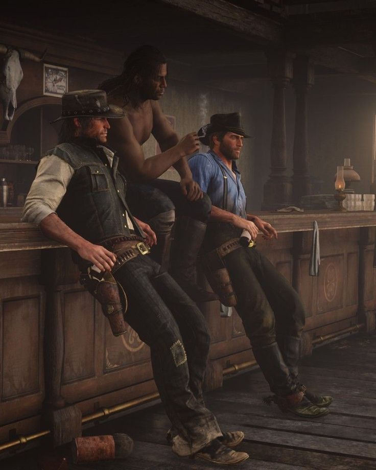 two men sitting at a bar in the video game unchacked, with another man standing next to them