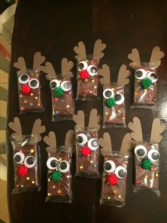 six bags with reindeer noses and eyeballs on them