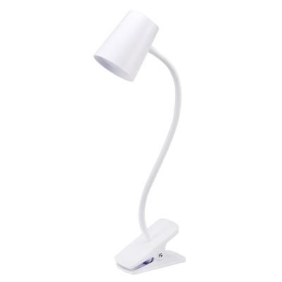 a white desk lamp on a white background