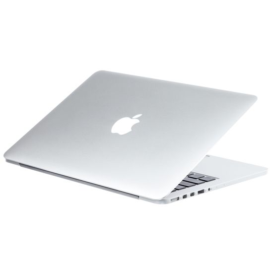 an apple laptop computer sitting on top of a white surface