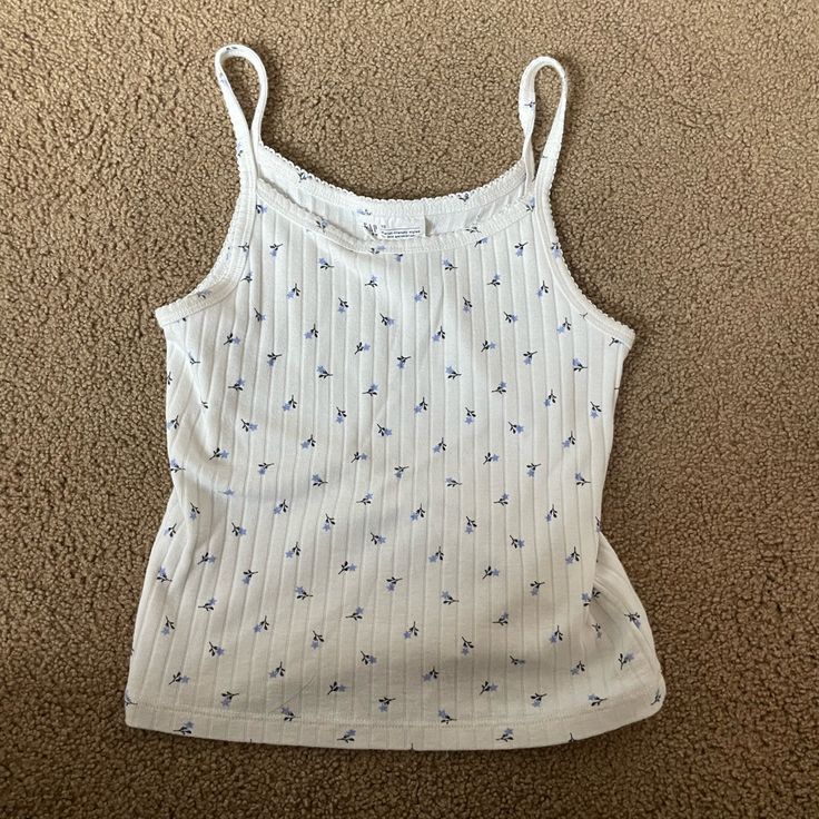 Gap Brand New Condition Girls Size 10 Gap Cotton Tops For Summer, Spring Cotton Tank Top By Gap, Gap Cotton Casual Tank Top, Trendy Gap Tops For Spring, White Cotton Gap Top, Cute White Sleeveless Top, White Gap Tops For Summer, White Fitted Top By Gap, Fitted White Gap Top