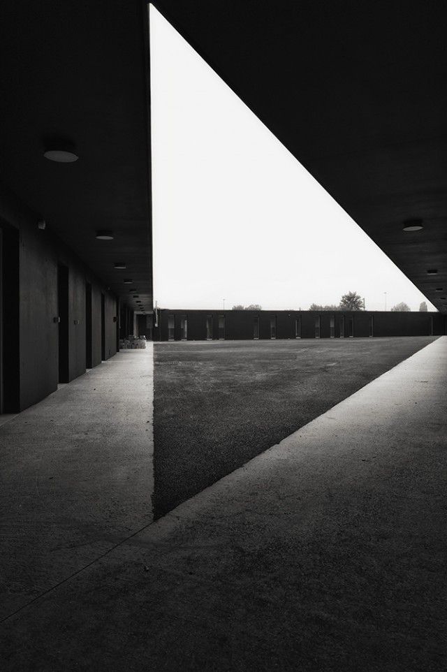 a black and white photo of an empty building