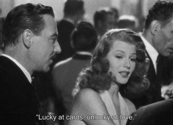 an old black and white photo of two people talking to each other with the caption lucky at cards, lucky at love