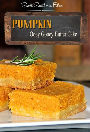 pumpkin gooey gooey butter cake on a plate with a wooden sign above it