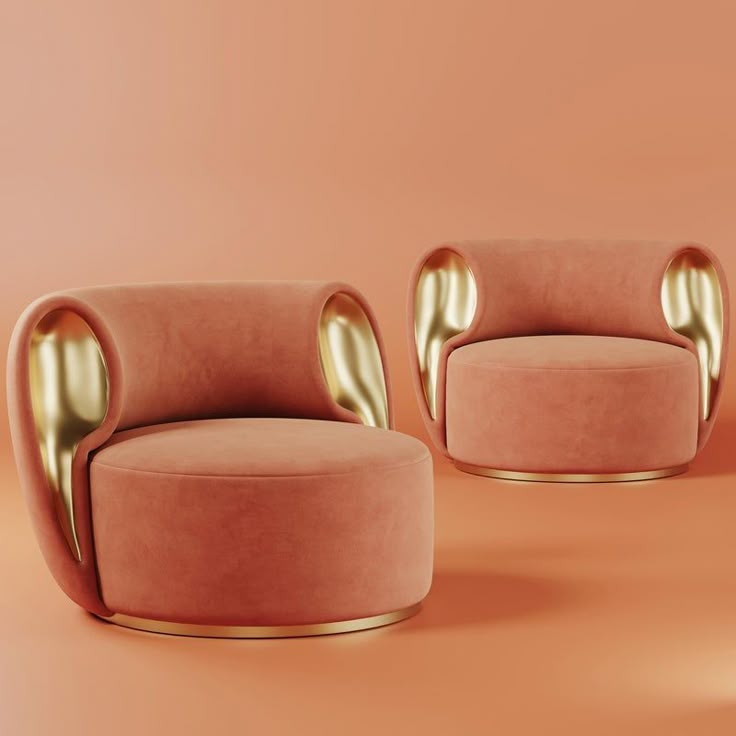 two pink chairs with gold accents on an orange background