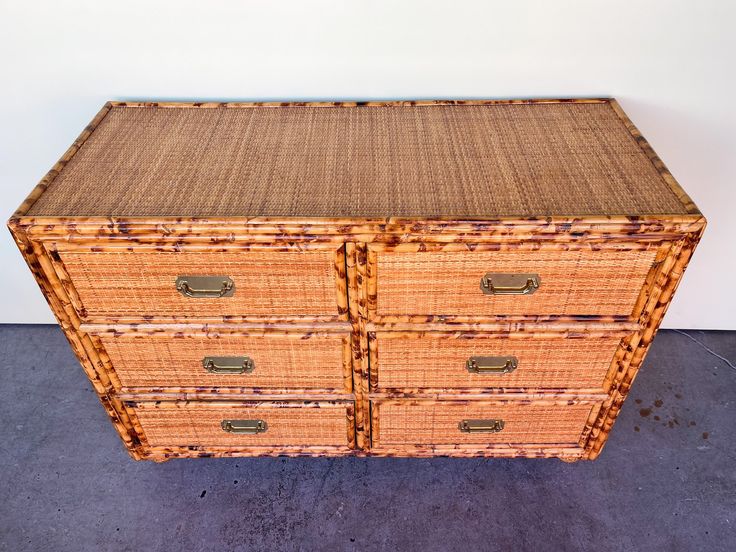 an old wicker chest with two drawers