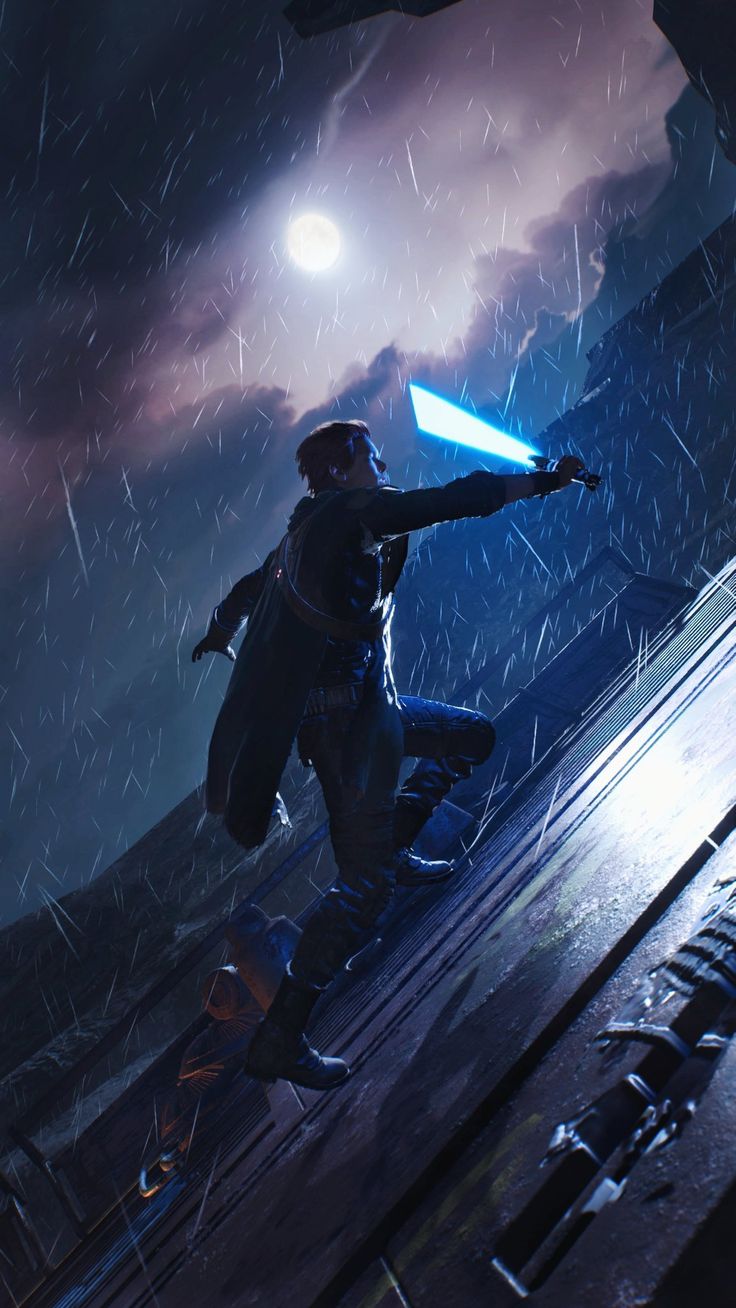 a man holding a light saber in the rain