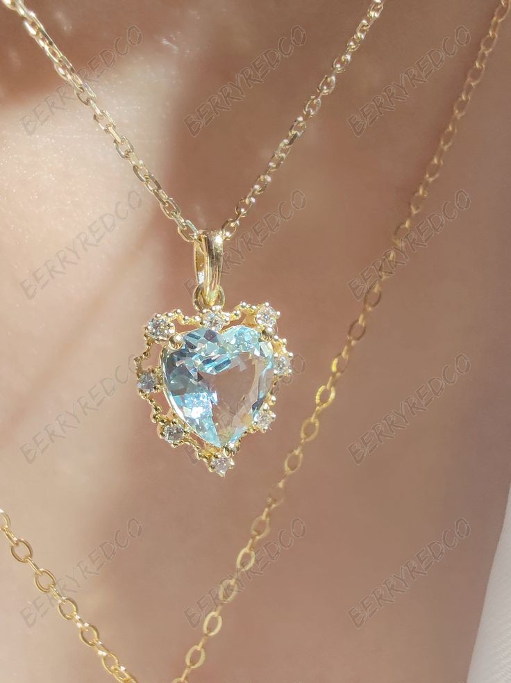 "Natural Heart Shape AAA 1ct Aquamarine with Tiny Diamond Pendant Necklace, Solid 18k Gold March Birthstone Necklace --- Made to Order --- Metal: Solid 18K Yellow Gold --- Stone: 1CT AAA Natural Aquamarine - 1pcs , Tiny Diamond - 8pcs --- Center Stone Shape: Heart Shape --- Measures with hoop 16.3 x 10.6 mm. A beautiful heart shape aquamarine and diamond pendant necklace with 18 karat gold chain, in the color of light blue. A perfect gift for your significant others or yourself. With AAA 1 carat Beady Eyes, Preppy Things, March Birthstone Necklace, Fancy Accessories, Easy Spells, Pretty Jewelry Necklaces, Magical Jewelry, Jewelry Accessories Ideas, Dope Jewelry