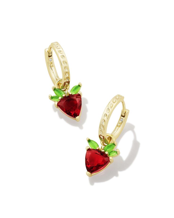 Strawberries and sparkle combine to make a truly irresistible style: the Strawberry Gold Huggie Earrings in Dark Pink Crystal. Paired with simple studs or a statement style, these cute strawberry charms will catch everyone’s attention (and all the compliments!). These huggies are convertible, too: you can remove the charms for multiple looks. Metal 14k Yellow Gold Over Brass Material Red Crystal, Green Crystal Closure Ear Post Size 0.59" Outside Diameter, 0.54"L X 0.40"W Removable CharmDue to the one-of-a-kind nature of the medium, exact colors and patterns may vary slightly from the image shown. | Kendra Scott Strawberry Gold Huggie Earrings in Dark Pink | Crystal Dainty Jewelry Necklace, Simple Studs, Gold Huggie Earrings, Strawberry Charm, Engagement Rings Sale, Crystal Green, Bar Jewelry, Cute Strawberry, Zodiac Jewelry