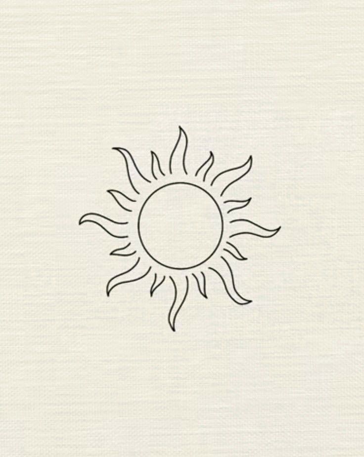 a black and white drawing of a sun