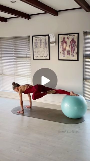 a woman is doing exercises on an exercise ball