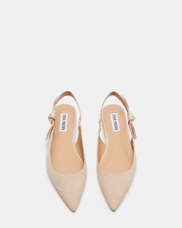 Indulge in effortless elegance with the OLSEN ballet flats. Featuring a stylish slingback design and delicate bow detail, these pointed-toe flats exude charm and femininity. .5 inch heel height Textile upper material Leather lining Leather sock Synthetic sole Imported Elegant Beige Flat Slingback Pumps, Beige Flat Slingback Pumps For Formal Occasions, Elegant Ballet Flats With Low Heel And Heel Strap, Flat Slingback Pumps For Office, Flat Slingback Pumps For Spring Office Wear, Spring Office Flat Slingback Pumps, Elegant Flat Slingback Pumps For Office, Formal Flat Slingback Pumps, Elegant Spring Kitten Heels