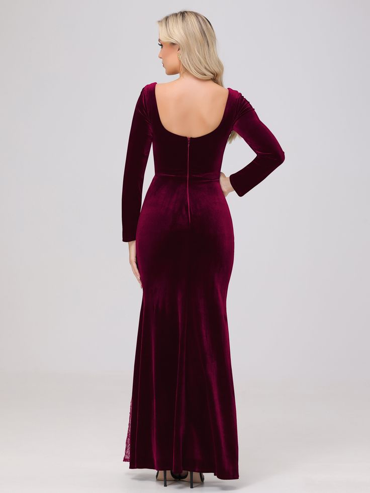 the back of a woman wearing a long velvet dress with an open neck and sleeves