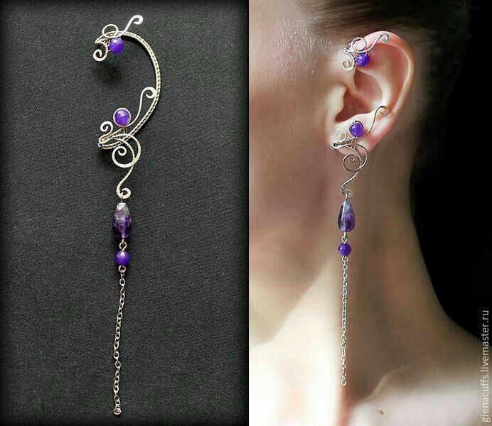 the ear is decorated with purple beads and silver wire, while the other side has a dangling chain attached to it