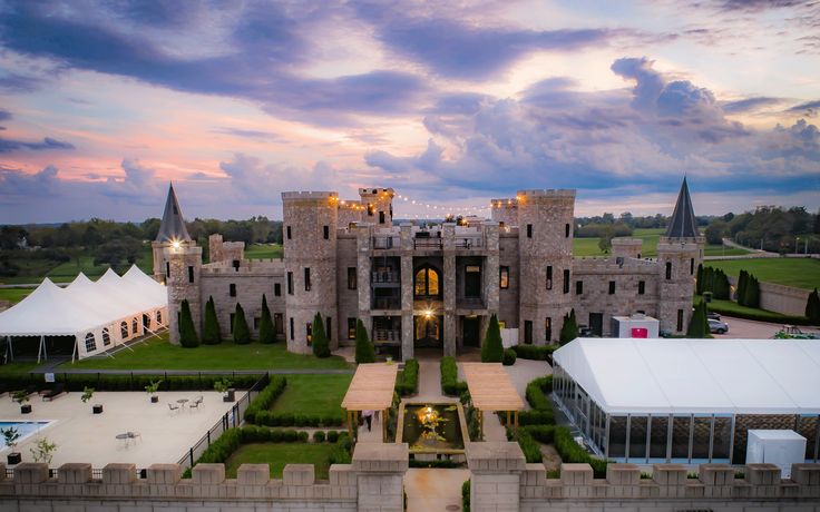 an aerial view of a large castle like building