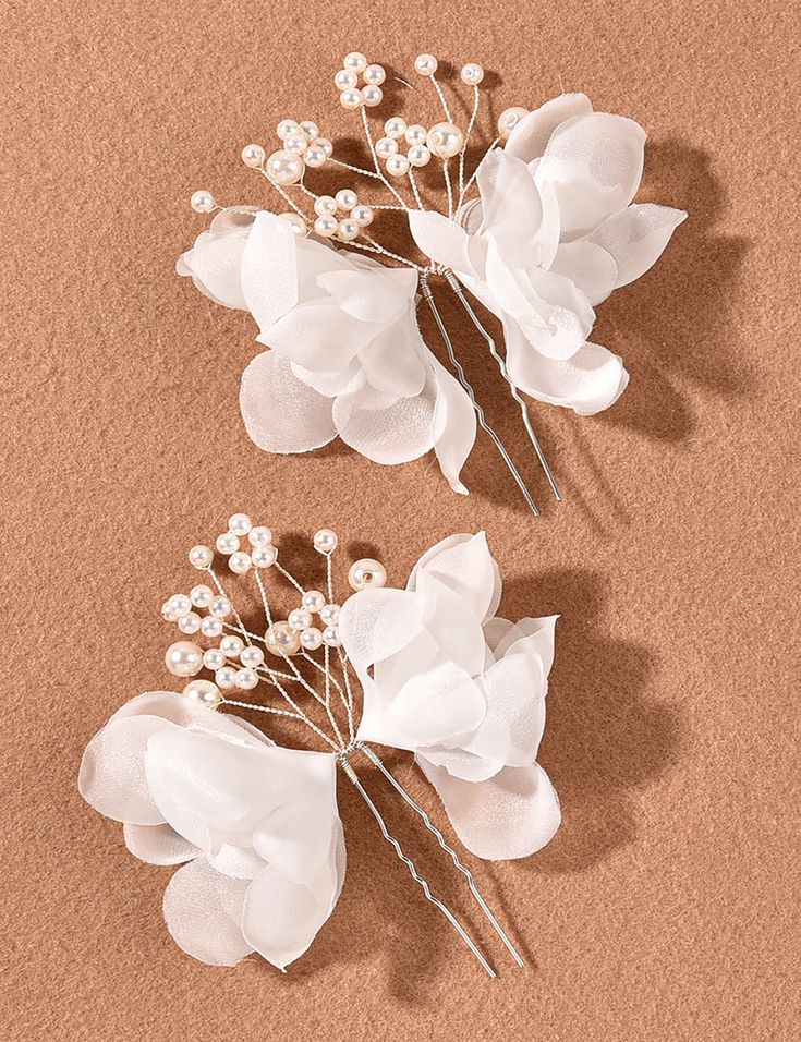 Add butterflies to your hair with these fluttering hairpins, featuring thin-layered cloth and an array of pearl clusters. Flower Headdress, Pearl Headpiece, Bridal Wedding Hair, Pearl Hair Pins, Pearl Cluster, Flower Hair Pin, Bridal Hair Pins, Pearl Flower, Hair Pin