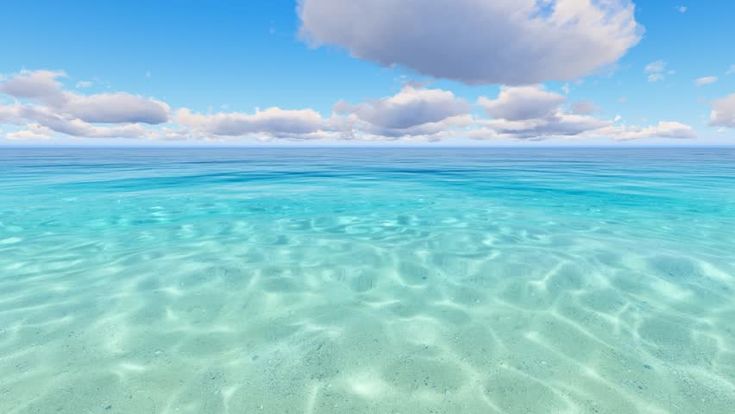 the water is very clear and blue with some clouds