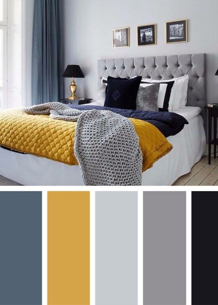 a bedroom with yellow and gray colors